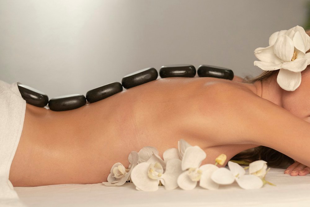 Luxury private massage room with candles and warm lighting for Nuru and Tantric sessions in London